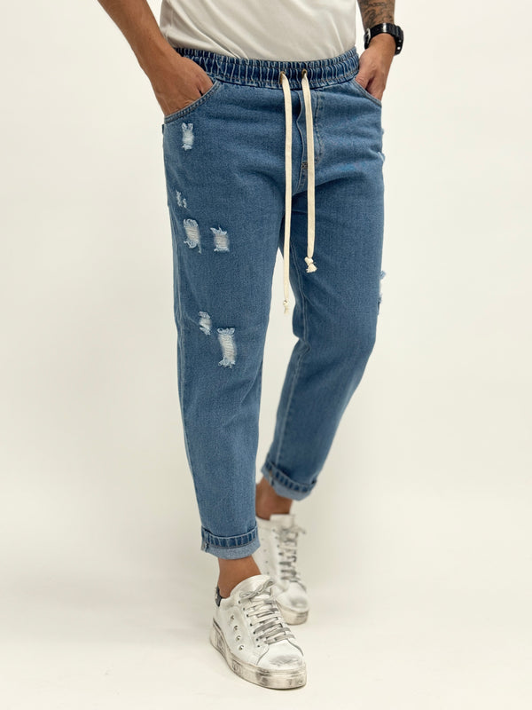 Jeans laccetto carrot fit con rotture intermedio