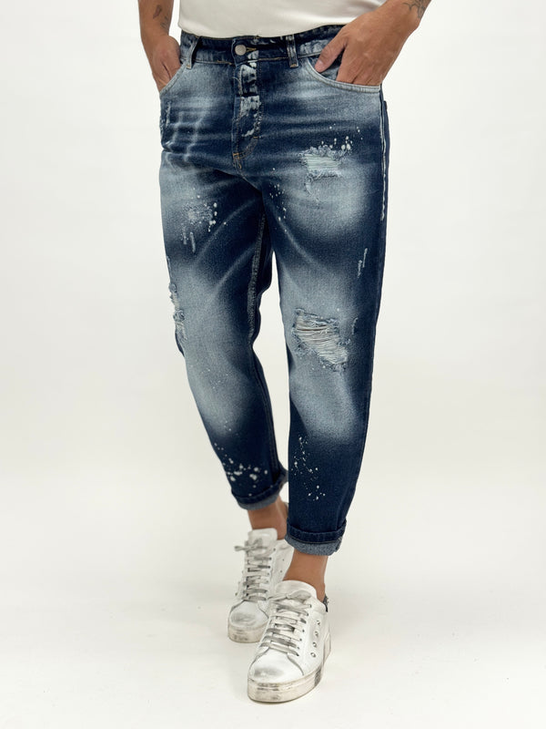 Jeans carrot fit scuro rotture schizzi vernice