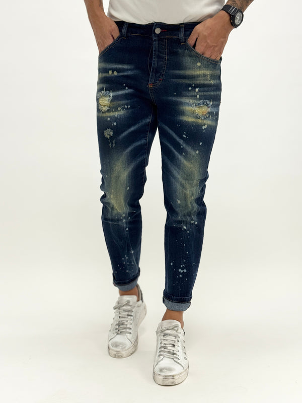 Jeans modello DSQ slim scuro macchiato