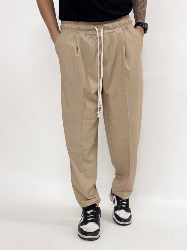 Pantalone fondo ampio beige
