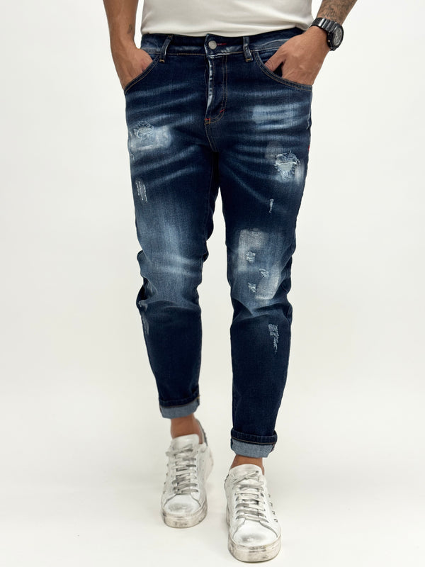 Jeans modello DSQ slim scuro rotturine