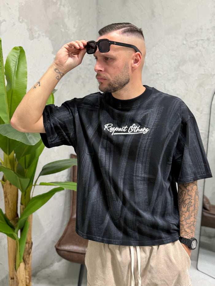 T-shirt boxy fit sporca con ricamo nera